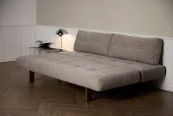 Canapé convertible en polyester beige et pied en chêne foncé 202x65cm Eilis - Innovation Living