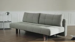 Canapé convertible en polyester beige et pied en chêne foncé 202x65cm Eilis - Innovation Living
