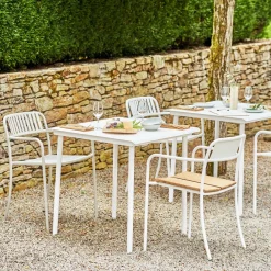 Chaise de jardin avec accoudoirs à lames en acier inoxydable blanc pur Patio - Tolix