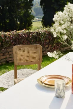 Chaise de jardin en bois de teck et cannage C-Chair - Gubi
