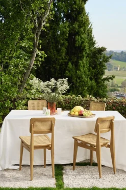 Chaise de jardin en bois de teck et cannage C-Chair - Gubi