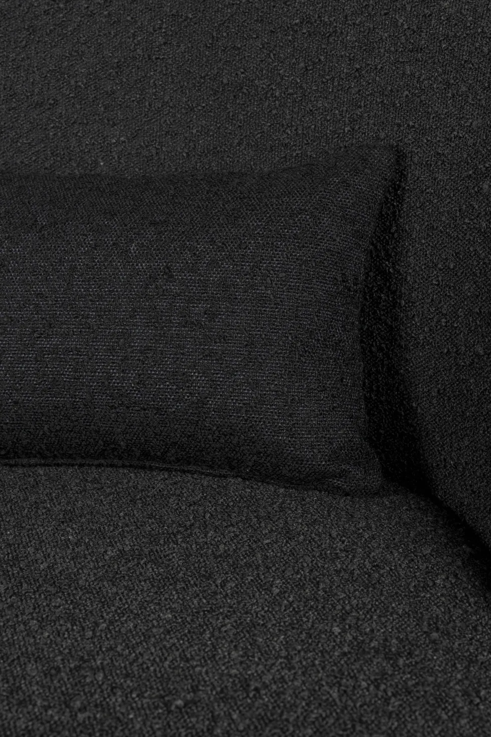 Fauteuil en tissu bouclé noir Rodin - Dutchbone