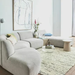 Repose-pieds en bouclé taupe L Jax - Hkliving