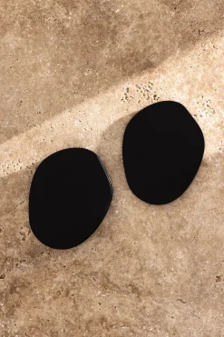 4 sous verres organiques en acier noir 10x2cm Kiva - Metallbude
