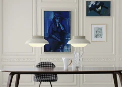 Table à manger en bois de frêne teinté noir 120x230cm Elliptique - Gubi